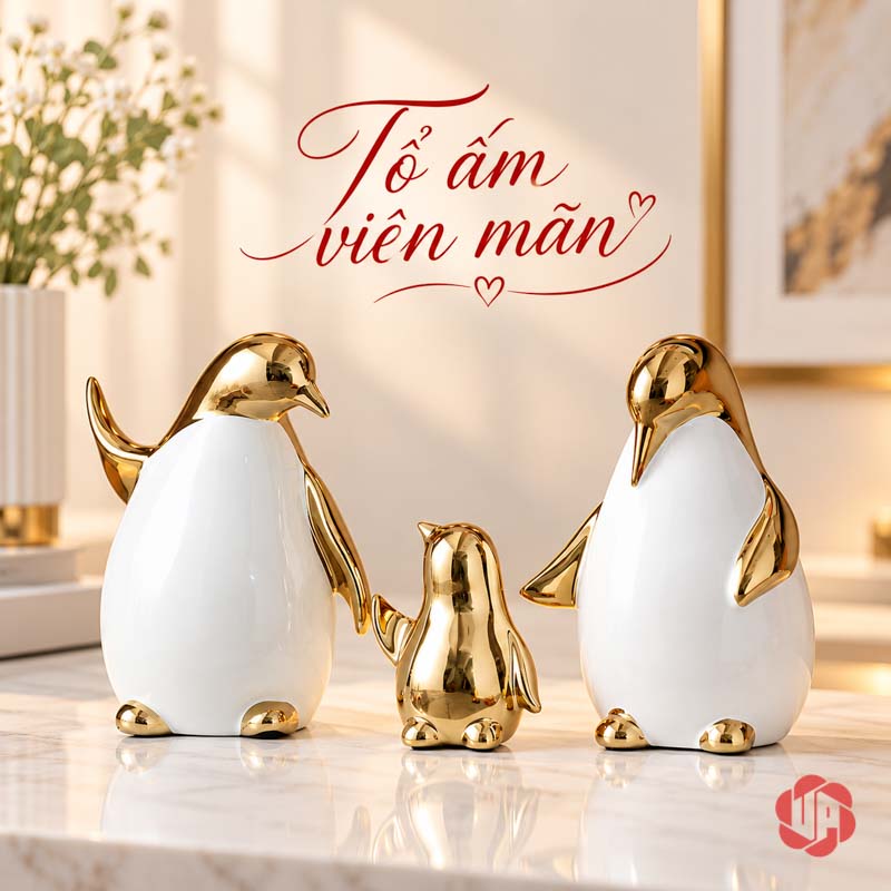 Tượng Decor Gia Đình Chim Cánh Cụt Trắng Vàng UPV080 Ba chim cánh cụt đặt thành cụm trên mặt bàn vân đá