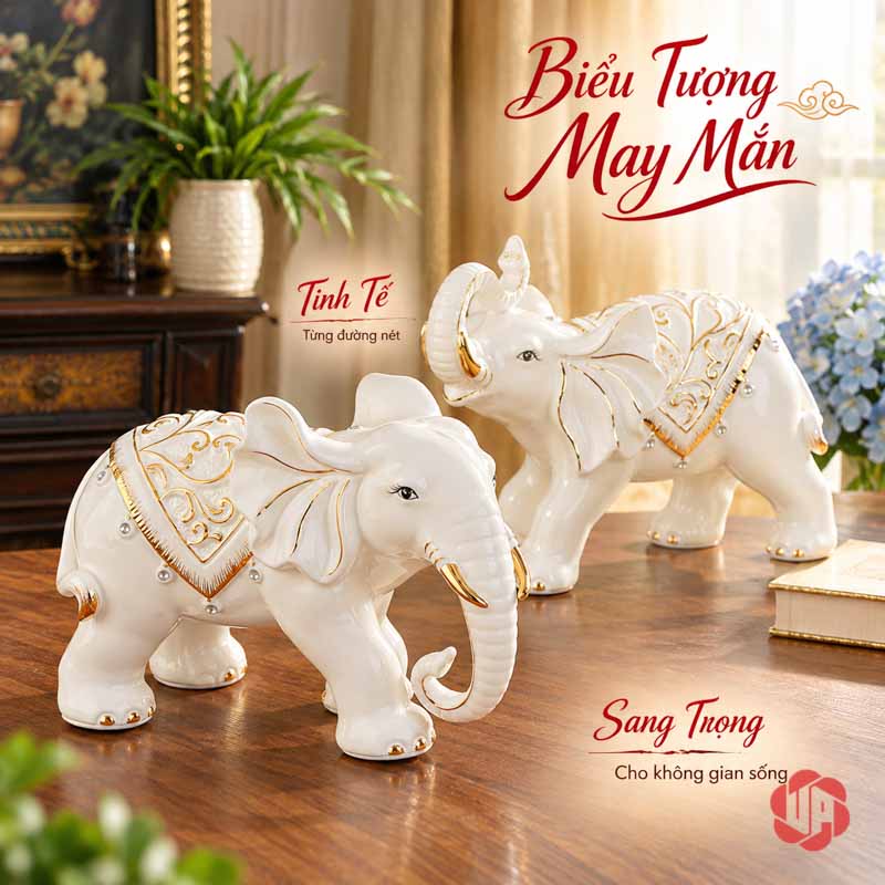 Đồ Trang Trí Nhà Đẹp Đôi Voi Gốm Sứ May Mắn UPS015 Cặp voi trắng phối vàng trong góc phòng có cây xanh