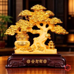 Mặt trước cây tiền vàng, hũ tiền bên trái và thỏi vàng bên phải