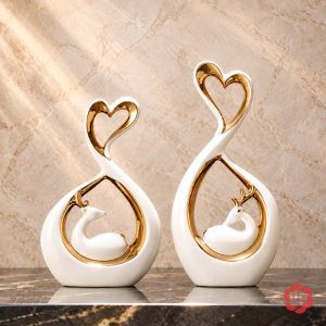 Cặp tượng hươu và trái tim gốm trắng phối vàng