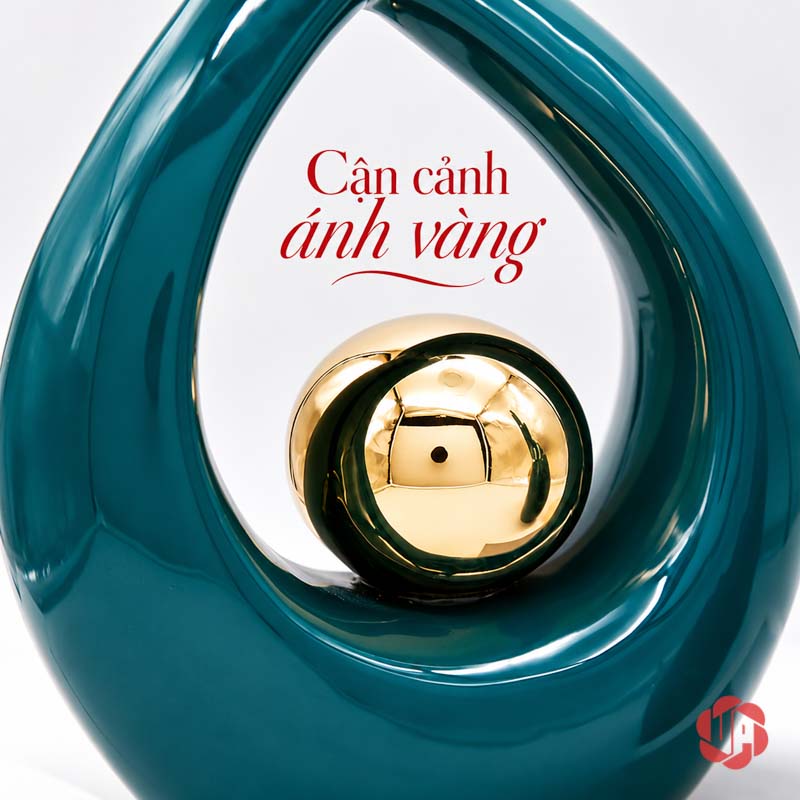 Đồ Trang Trí Decor Nghệ Thuật Xanh Ngọc Ôm Cầu Vàng UP027 Đồ trang trí decor cận cảnh bề mặt cầu vàng sáng bóng