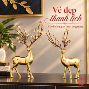 Cặp tượng hươu đồng hoa trắng đặt trên tủ mặt đá tối