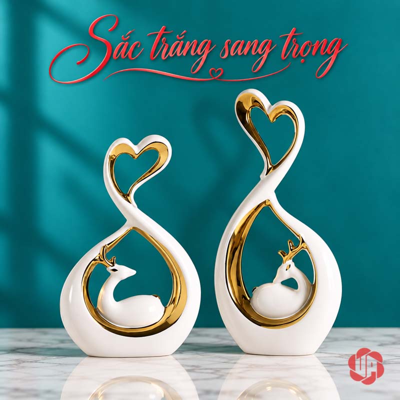 Đồ Decor Đôi Hươu Và Trái Tim Gốm Sứ UP069V Cặp hươu gốm trắng trước nền xanh đậm