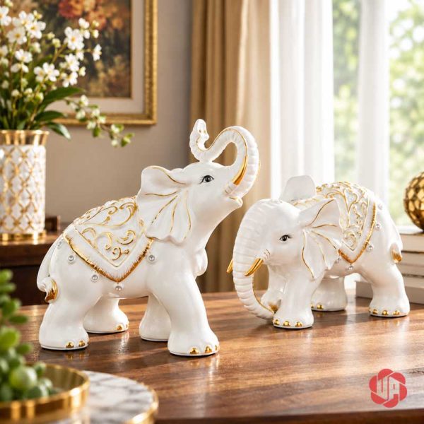 Đôi voi gốm sứ trắng phối vàng trên bàn phòng khách