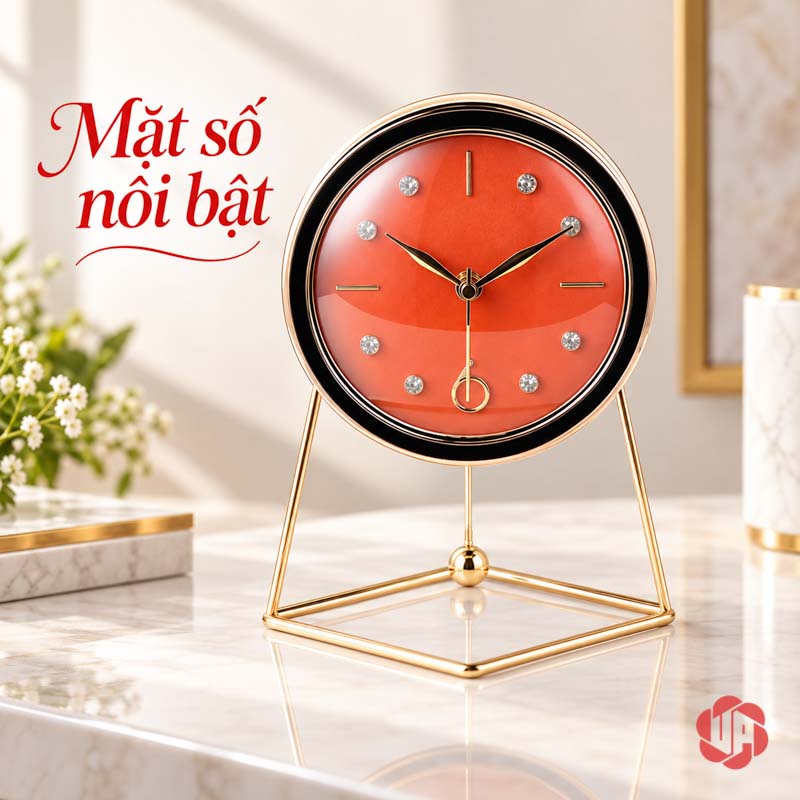 Đồng Hồ Để Bàn Đẹp, Mặt Tròn Chân Khung Thanh UPHB10 Đồng hồ mặt cam đỏ nhìn chính diện trên bàn sáng