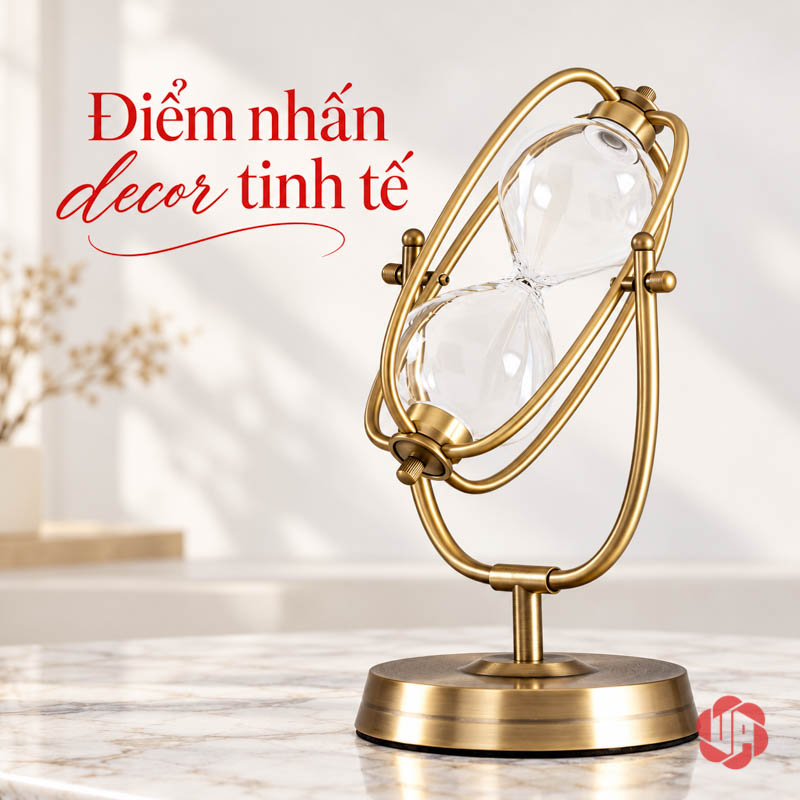 Đồng Hồ Cát Trang Trí Khung Oval Vàng UPV007-A Đồng hồ cát oval vàng trên bàn sáng màu