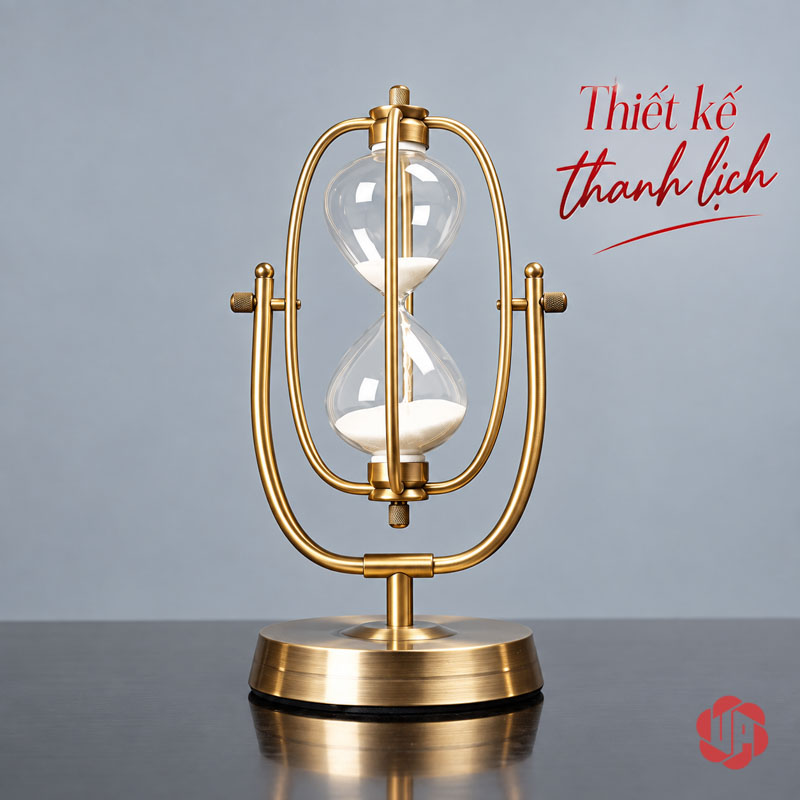 Đồng Hồ Cát Trang Trí Khung Oval Vàng UPV007-A Đồng hồ cát oval ở tư thế thẳng trên mặt bàn phản chiếu