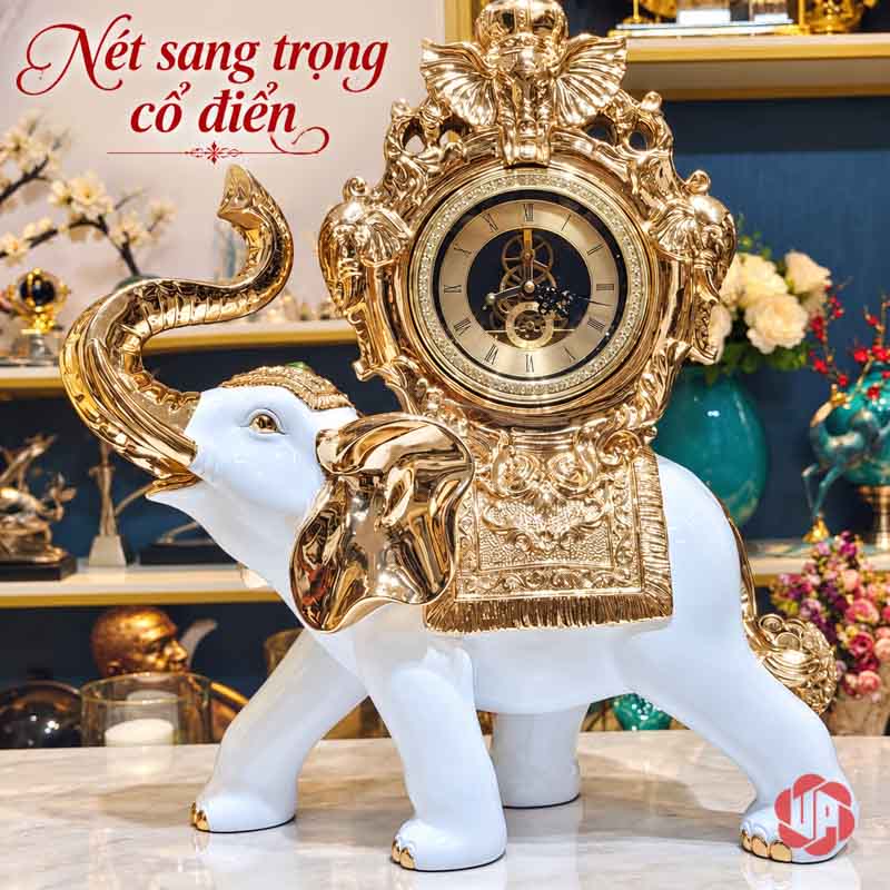 Đồng Hồ Trang Trí Voi Phong Thủy Trắng Vàng UPHB23 Đồng hồ voi trắng nhìn chếch với vòi hướng lên bên trái