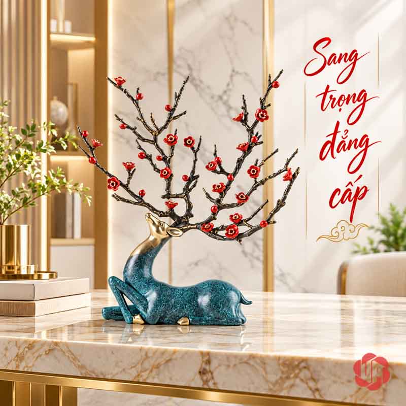 Tượng Hươu Bằng Đồng Tài Lộc, Dáng Nằm Hoa Đỏ UPD070 Tượng hươu nằm với tán hoa đỏ bày trên bàn đá sáng màu