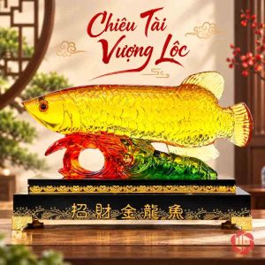 Tượng cá rồng vàng trên sóng đỏ xanh và đế đen