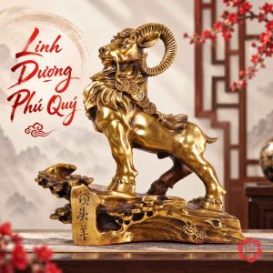 Tượng dê vàng đồng ngậm xâu tiền nhìn nghiêng