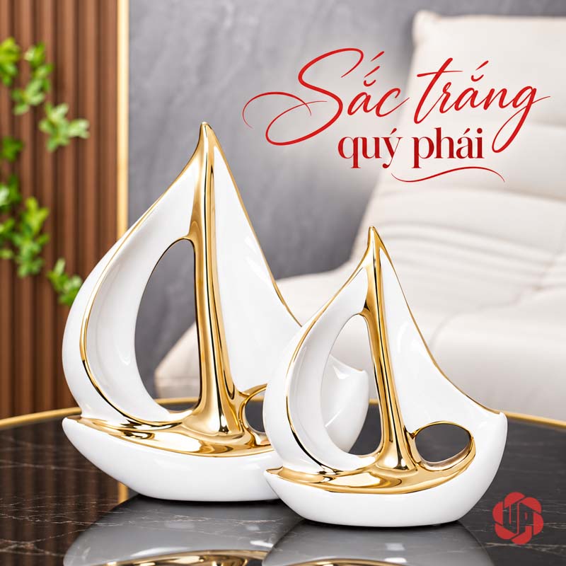 Tượng Decor Cánh Buồm Xuôi Gió Gốm Sứ Trắng Vàng UP053-A Tượng decor cánh buồm xuôi gió hai cỡ xếp trước sau trên bàn
