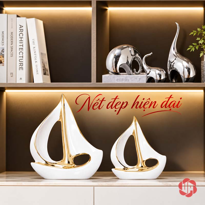 Tượng Decor Cánh Buồm Xuôi Gió Gốm Sứ Trắng Vàng UP053-A Tượng decor cánh buồm xuôi gió phối đôi trên kệ gỗ dưới tượng voi