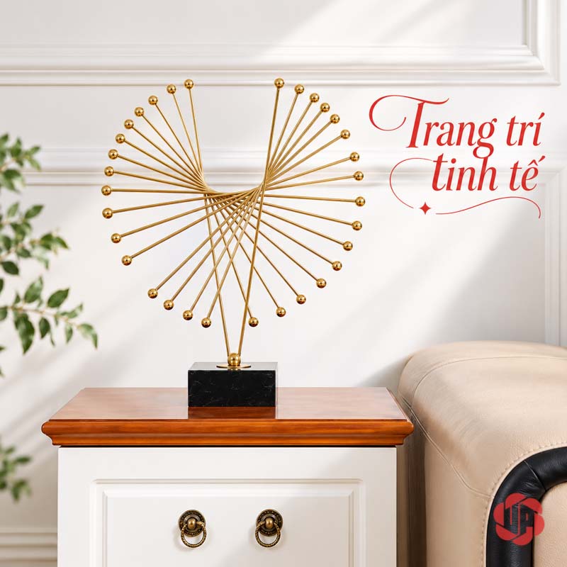 Tượng Decor Cánh Chim Bay Màu Vàng Kim UP052 Tượng decor cánh chim bay đặt riêng trên tủ trắng mặt gỗ