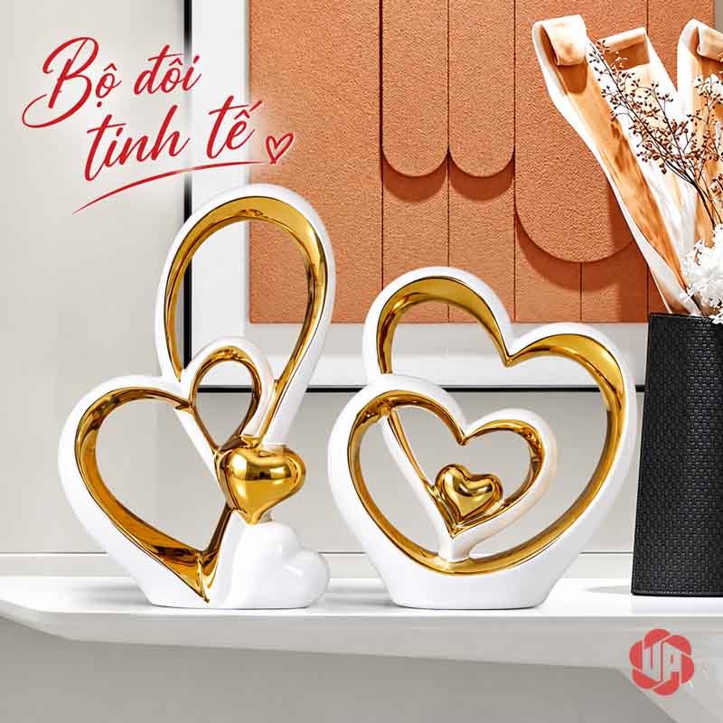Tượng Decor Đôi Trái Tim Trắng Vàng UP062V Tượng decor trái tim trắng vàng trước tranh màu đất