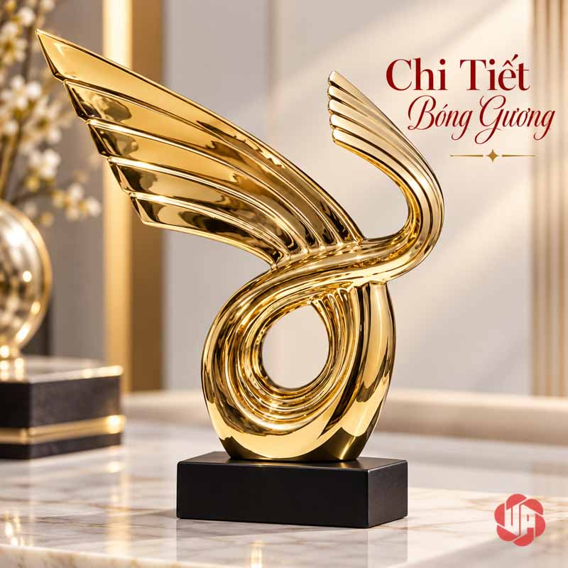 Tượng Trang Trí Nghệ Thuật Thuận Buồm Xuôi Gió UP055 Tượng trang trí nghệ thuật sắc vàng nhìn chếch trên bàn