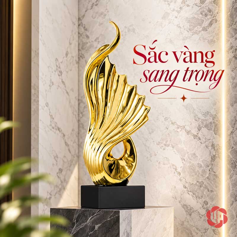 Tượng Trang Trí Nghệ Thuật Giàu Có Đến Từ Mọi Hướng UP065V Tượng trang trí nghệ thuật vàng trên bục trước tường vân đá