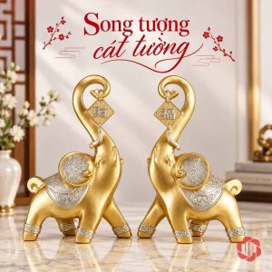 Cặp voi vàng đứng cạnh nhau, vòi cuộn cong và thẻ chữ hình thoi