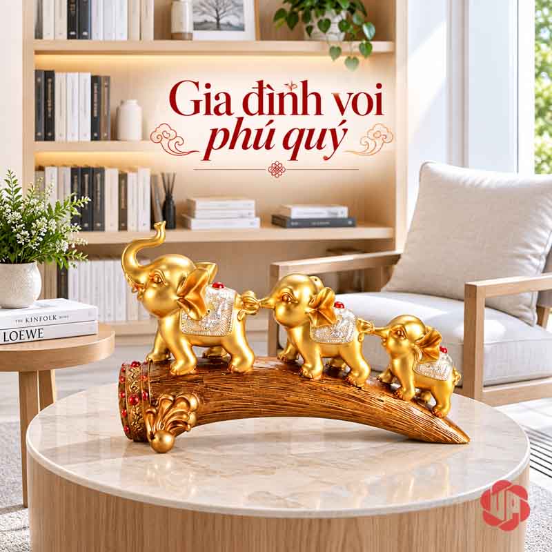 Tượng Gia Đình Voi Hạnh Phúc Trang Trí Nội Thất Phòng Khách UPV022 Tượng gia đình voi màu vàng trên đế cong đặt trên bàn tròn trước kệ sách