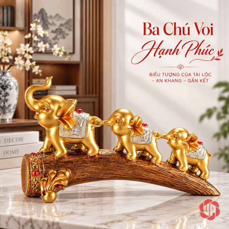 Tượng Gia Đình Voi Hạnh Phúc Trang Trí Nội Thất Phòng Khách UPV022 Tượng ba voi vàng trên đế nâu cong trong không gian phòng khách có hoa trang trí