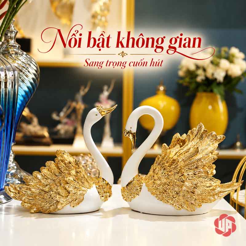Đôi Tượng Thiên Nga Trắng Cánh Vàng UPV060 Đôi tượng thiên nga trên mặt kê sáng trước kệ trưng bày