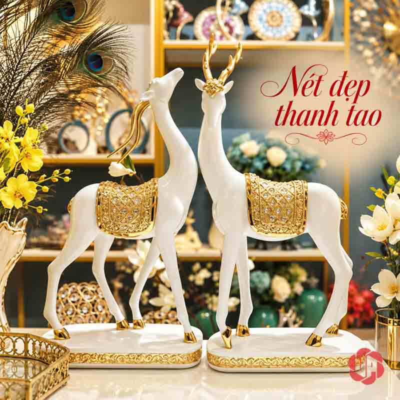 Đôi Tượng Dê Nghệ Thuật Trắng Vàng UPV064 Đôi dê nghệ thuật trước kệ có hoa và phụ kiện trang trí