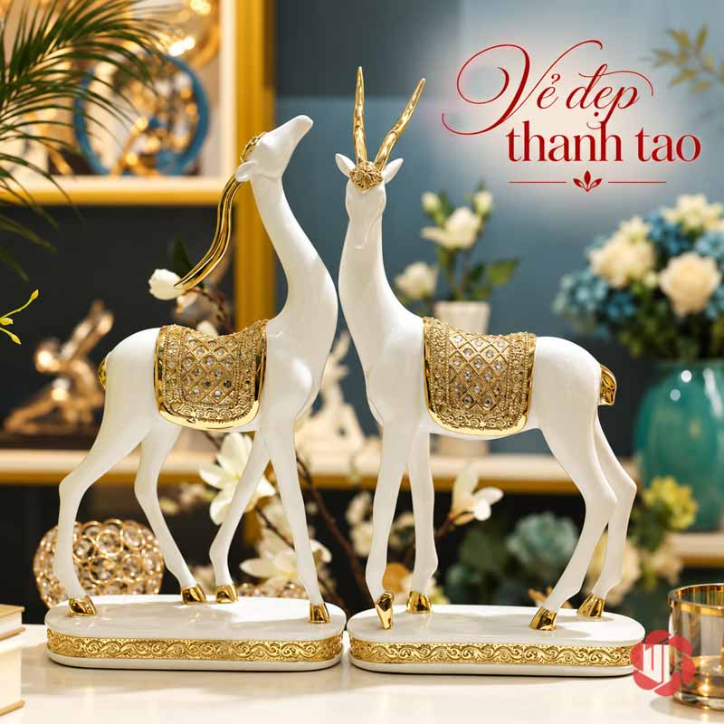 Đôi Tượng Dê Nghệ Thuật Trắng Vàng UPV064 Bộ đôi dê nghệ thuật với thân trắng và bệ viền vàng