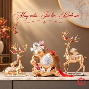 Hai hươu vàng đứng hai bên hồ lô màu vàng bạc